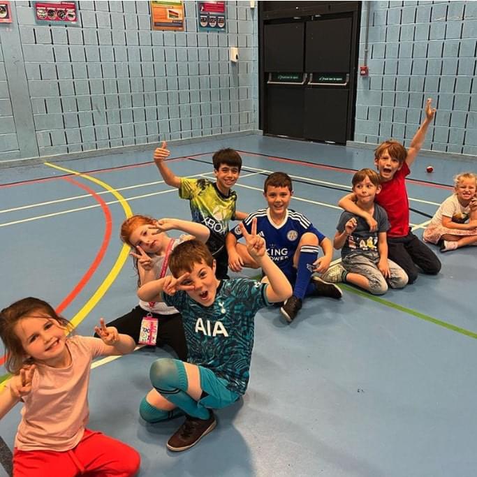 Bunch of children posing for a group photo at a Rising Stars birthday party in London